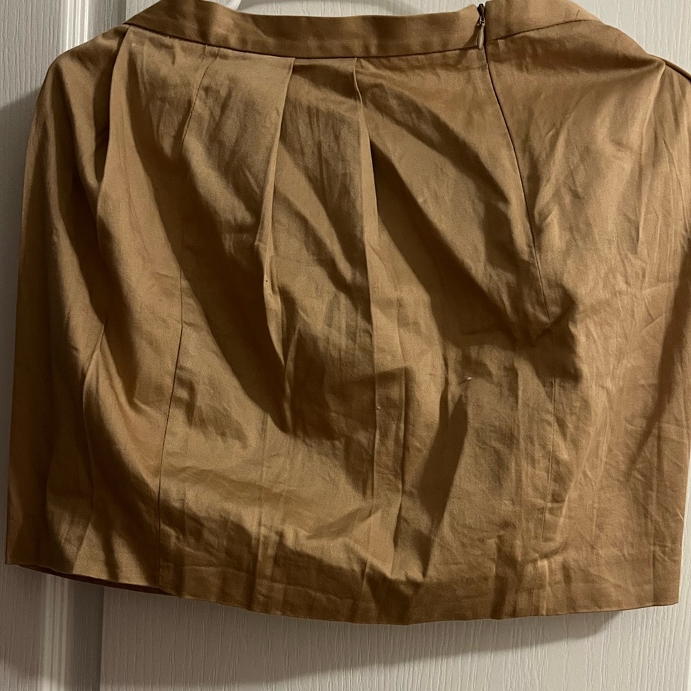 Tan coloured mini skirt